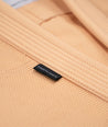 Close up view of M6 Mark 6 Gi lapel stitching and tag