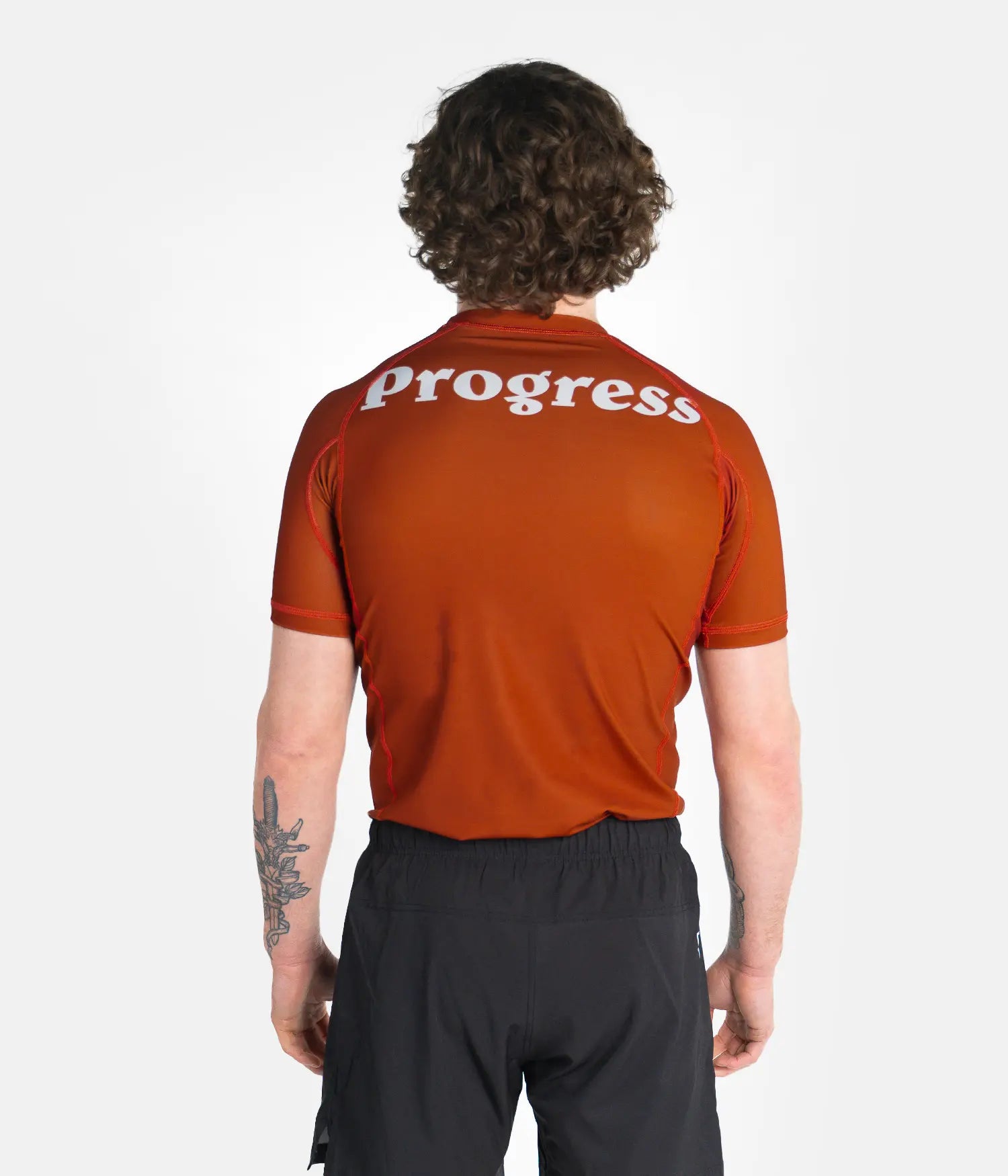 Classico Burnt Orange Rashguard (back view)