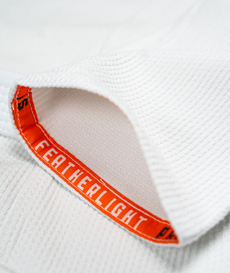 A close up image of the white Ladies Featherlight Lightweight Competition Kimono sleeve design